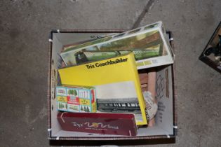 A box containing various model railway items