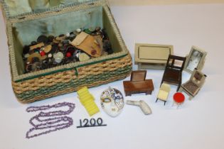 A sewing basket and contents of dolls house furnit