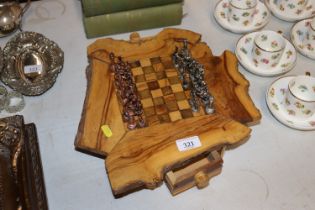 A rustic wooden chess board fitted two drawers and