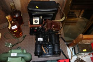 A quantity of various cameras and a pair of Russia