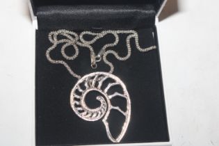 A Sterling silver Nautilus pendant and chain