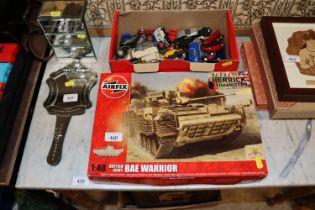 A box of various die-cast vehicles etc.; and an Ai