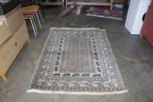 An approx. 6'3" x 4'7" Eastern patterned rug