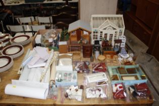 A large quantity of dolls house accessories, dolls