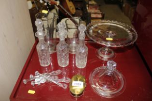 Three glass oil bottles, glass comport, glass stir