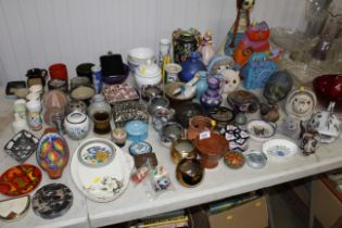 A collection of various decorative pottery items