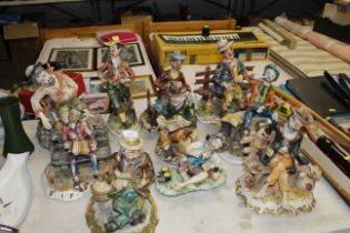 A collection of Capo di Monte figure groups