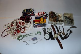 A collection of various costume jewellery; watches