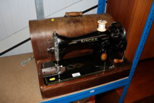 A Singer sewing machine in case