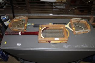 Three vintage sporting rackets