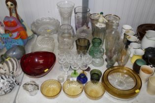 A collection of various table glassware including