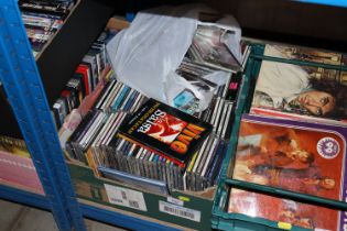 A large box and a bag of CDs and 45rpm records