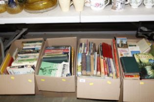 Four boxes of miscellaneous books