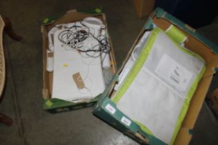 Two boxes containing Wii boards and various access