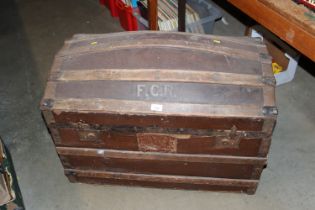 A wooden and metal bound dome topped trunk, inscri