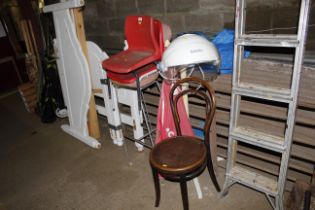 A metal framed high chair, two metal framed childr