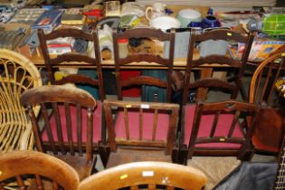 Three ladder back dining chairs; a Victorian elm s