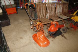 An electric Flymo hover mower