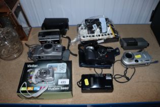 A collection of miscellaneous cameras etc