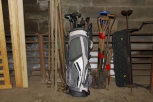 A golf bag and clubs