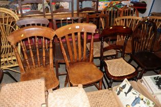 Two Victorian elm seated slat back kitchen chairs