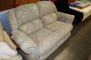 A two seater reclining sofa