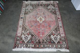 An approx. 5'5" x 3'11" Eastern Caucasian pattern