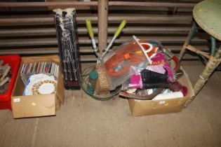 A box of various tools; fruit netting; hanging bas