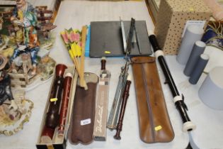 Various recorders, music stands, a large fan etc.