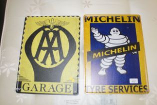 A replica tin Michelin sign and a replica AA garag