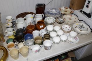 A collection of various tea and dinnerware