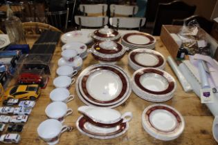 A Crown Ducal dinner service and a quantity of ros