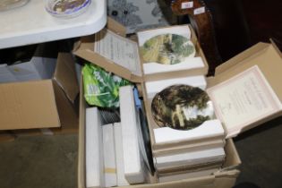 A box of miscellaneous collectors plates