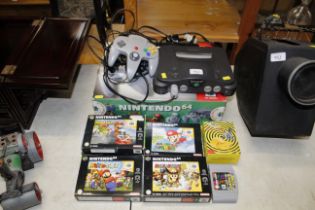 A Nintendo 64 games console; games including Mario