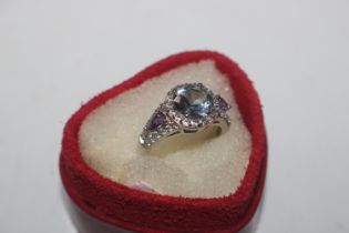 A 925 silver ring set with cubic zirconia and colo