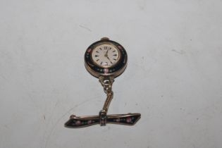 A silver gilt ladies pendant watch with black and