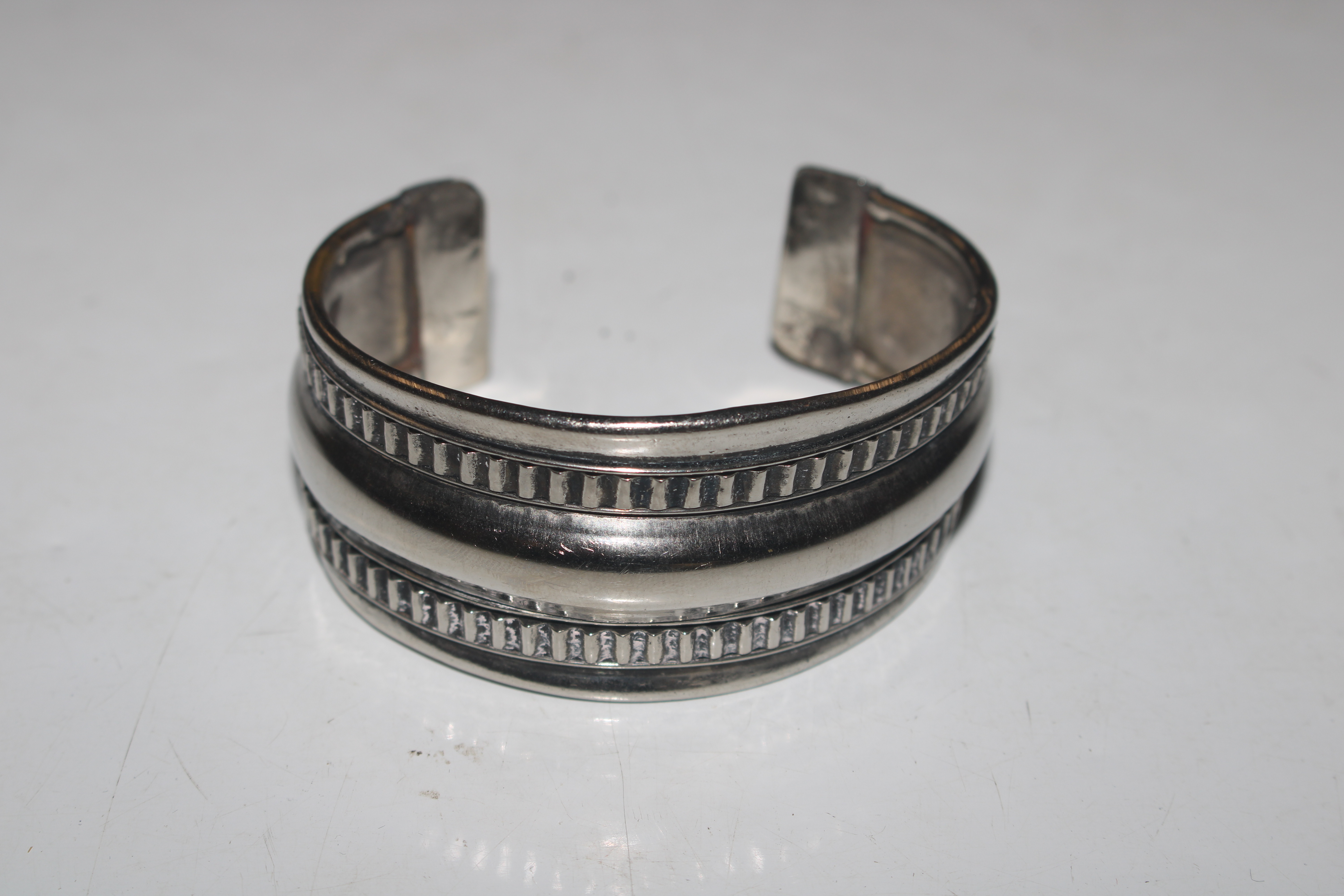 Two white metal bangles; a 925 silver ring with st - Image 4 of 10