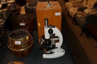 A microscope in fitted case