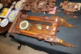A Victorian walnut cased regulator type wall clock