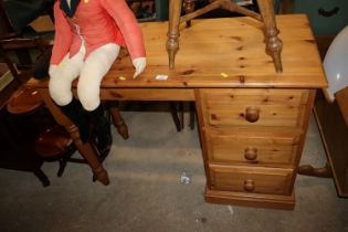 A stripped pine single pedestal dressing table fit