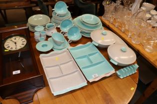 A quantity of Poole pottery twin tone dinnerware