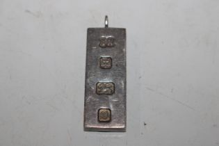 A silver ingot pendant, approx. 30gms, Hallmarked