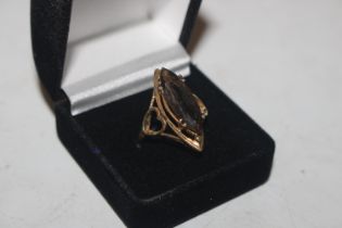 A 925 silver gilt ring set with smoky Quartz colou