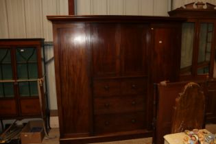 A 19th Century mahogany triple wardrobe