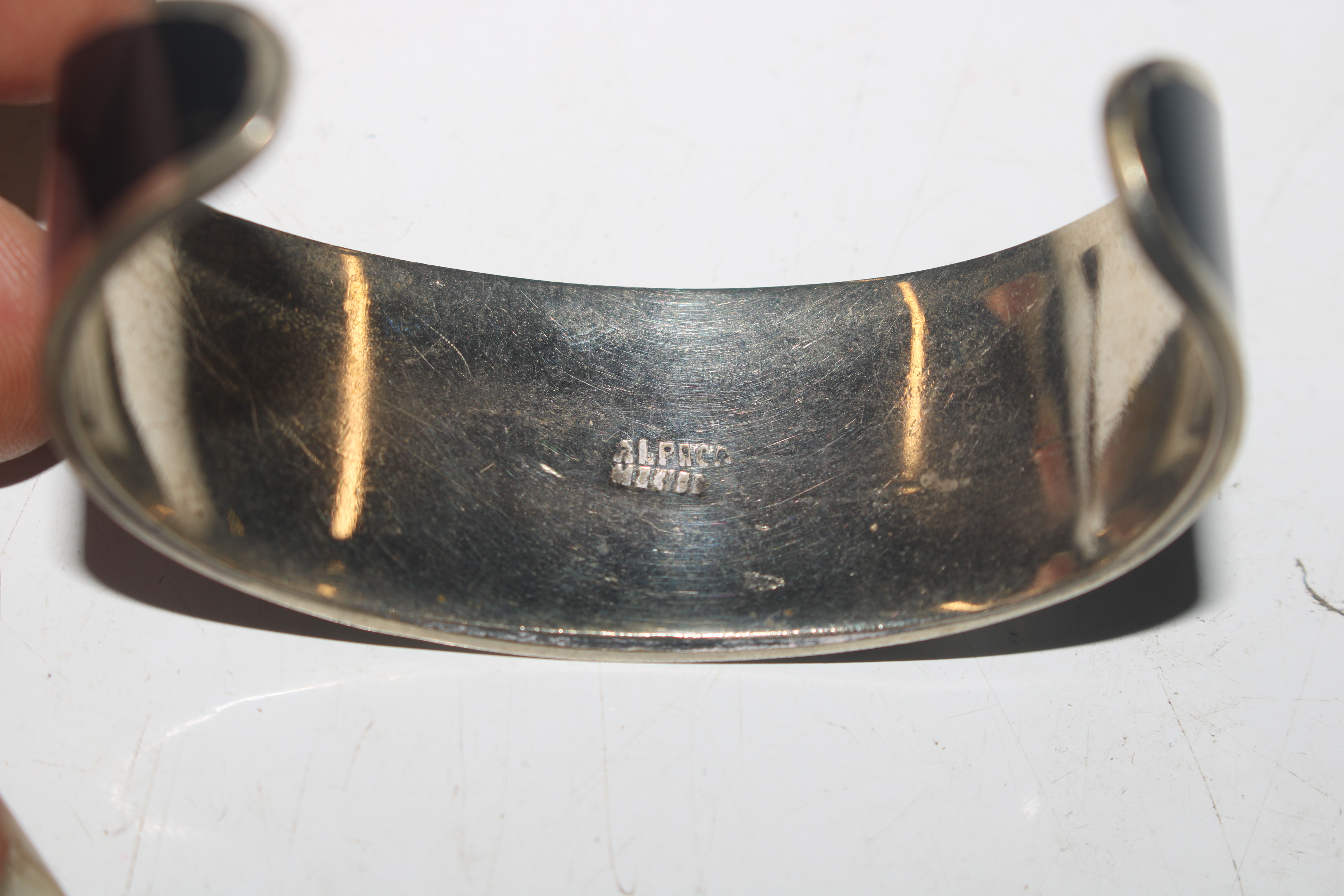 Two white metal bangles; a 925 silver ring with st - Image 6 of 10