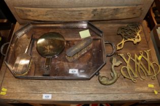 A plated two handled tea tray; two plated hair bru