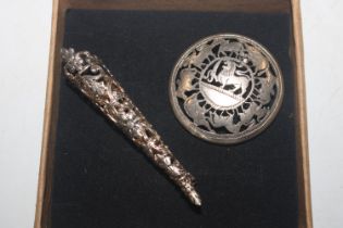 A white metal posy holder / brooch and a white met