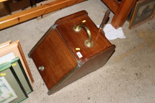 A late Victorian mahogany and brass mounted coal b