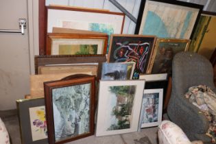 A large collection of paintings, prints and a map