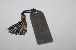 A large Millennium Hallmarked silver bookmark